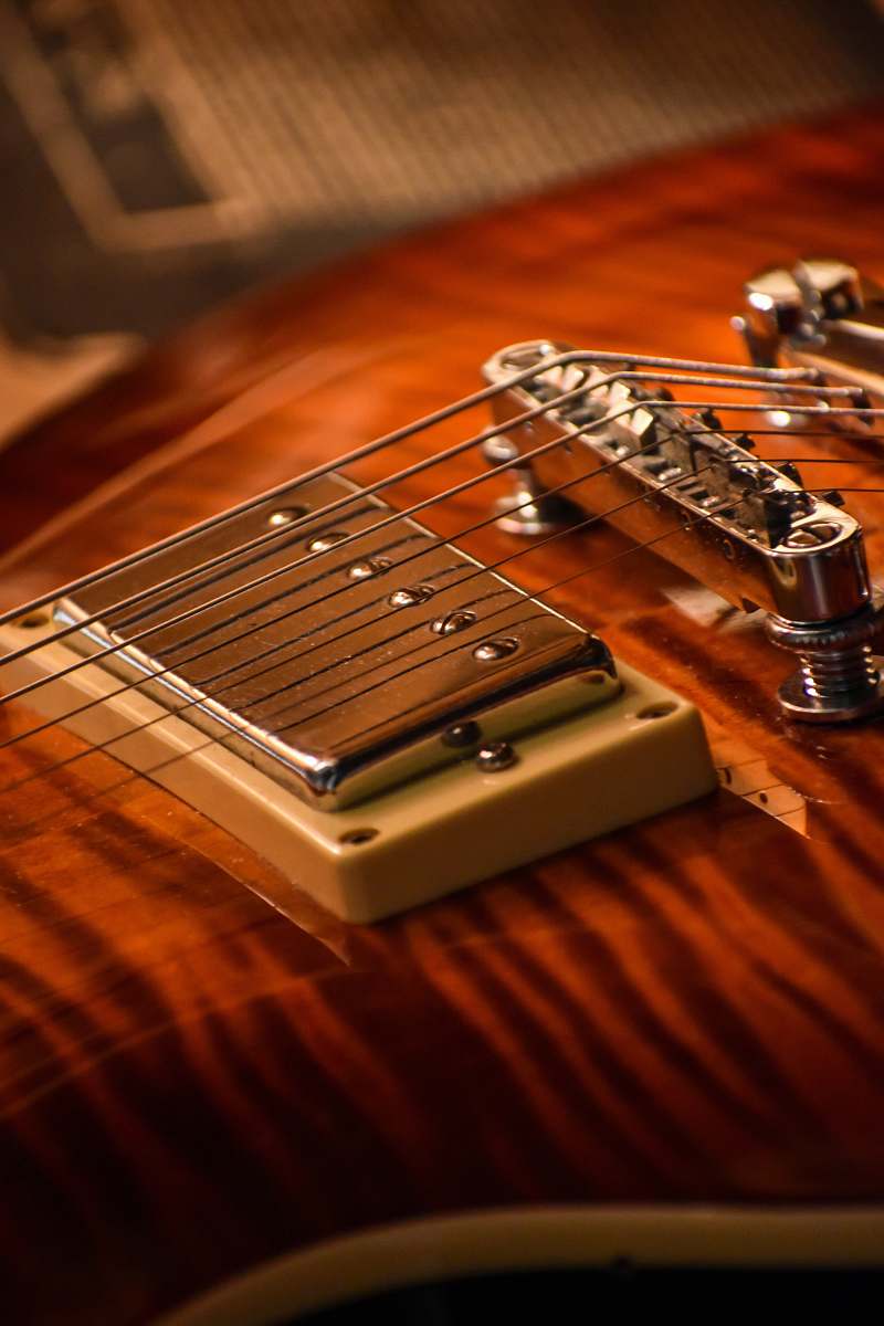 leisure activities close-up photo of brown electric guitar musical instrument